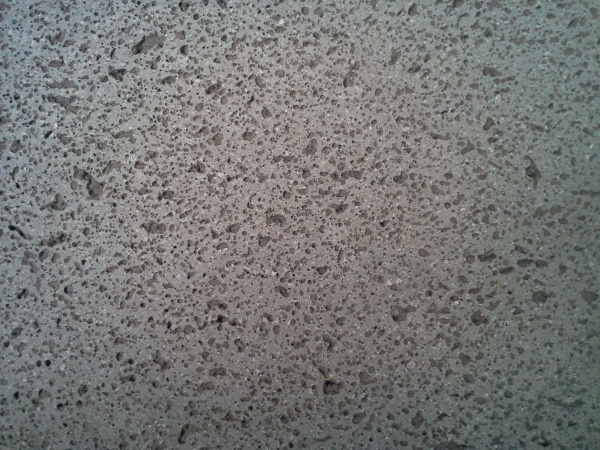 Grey with pores