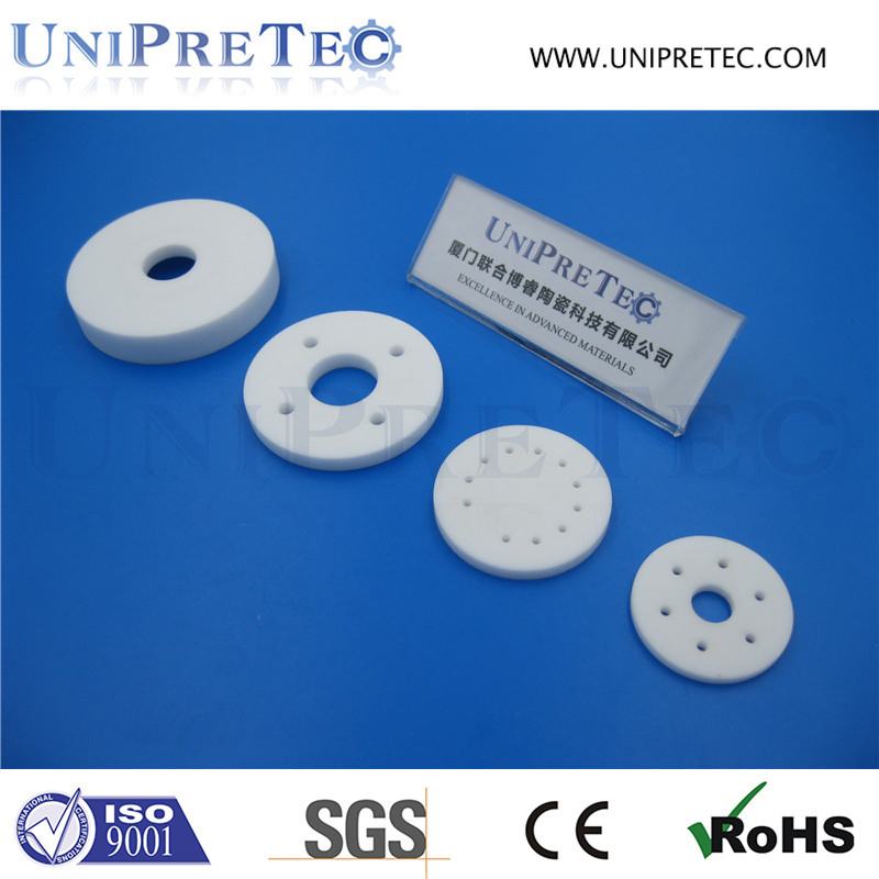 Ceramic insulators at insulating fitting